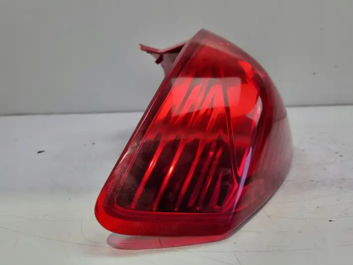 Opel Corsa D 3D HTB 06-14r TYLNIA LAMPA LEWA LEWY TYŁ 13211840 89038962A