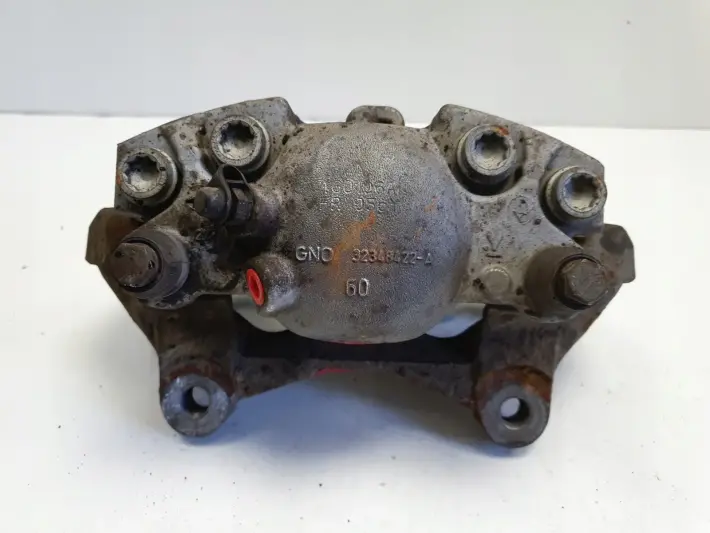 Audi A6 C7 PRZEDNI ZACISK HAMULCOWY prawy przód PASAŻERA 32348422-A