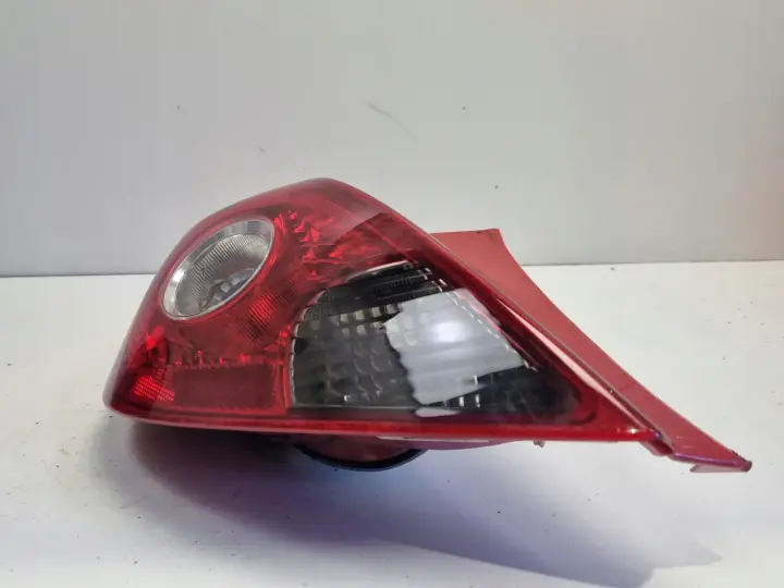 Opel Corsa D HTB 3D 06-11r TYLNIA TYLNA LAMPA LEWA lewy tył EUROPA 13211840