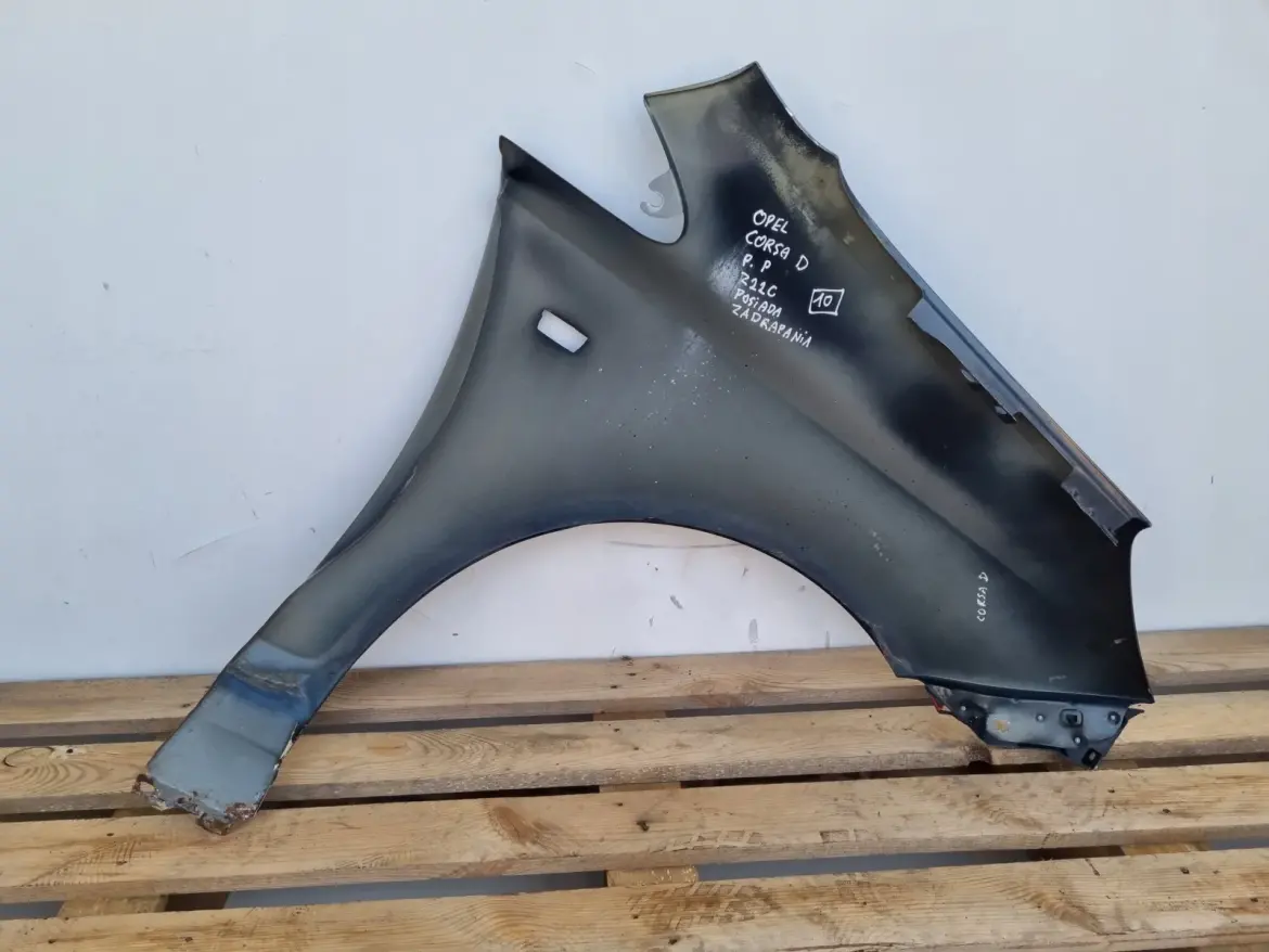 Opel Corsa D 06-14r PRZEDNI BŁOTNIK LEWY KIEROWCY czarny Z22C