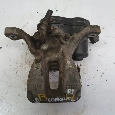 Toyota Corolla XII E21 TYLNY ZACISK HAMULCOWY prawy tył PASAŻERA A006B119B