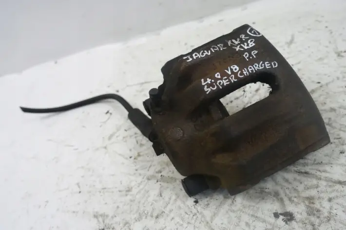 Jaguar XK XKR XK8 4.0 V8 PRZEDNI ZACISK HAMULCOWY