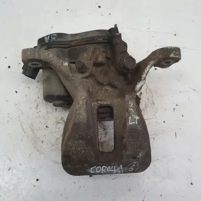 Toyota Corolla XII E21 TYLNY ZACISK HAMULCOWY lewy tył KIEROWCY A006B119B