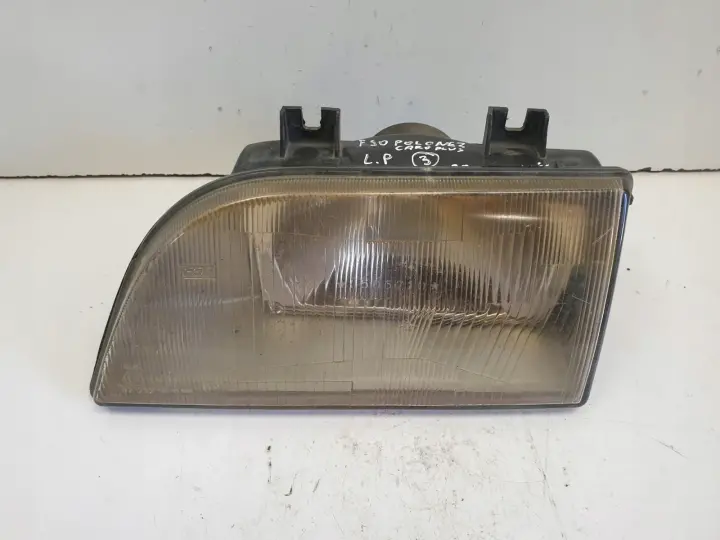 Polonez Caro Plus PRZEDNIA LAMPA LEWA lewy przód EUROPA