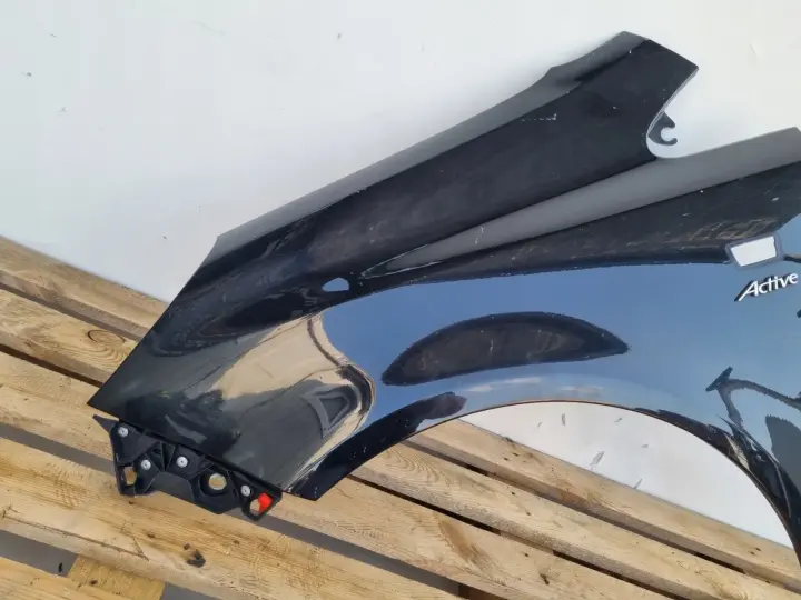 Opel Corsa D 06-14r PRZEDNI BŁOTNIK LEWY KIEROWCY czarny Z22C