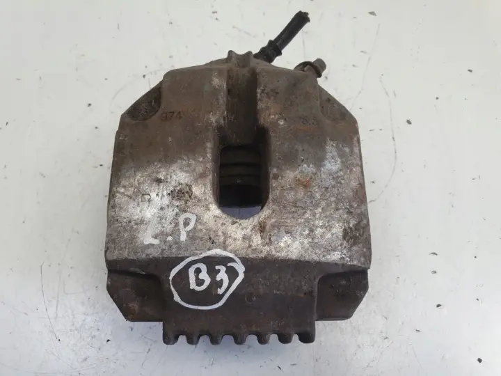 BMW E39 PRZEDNI ZACISK HAMULCOWY lewy przód kierowcy