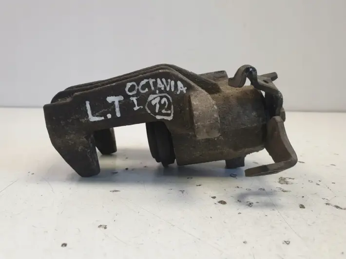 Skoda Octavia I ZACISK HAMULCOWY lewy TYŁ TYLNY