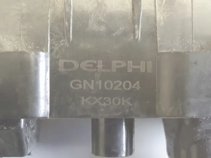 Opel Corsa D 1.2 1.4 16V CEWKA ZAPŁONOWA GN10204 delphi