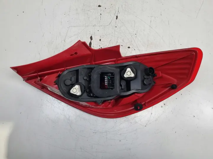 Opel Corsa D 3D HTB 06-14r TYLNIA LAMPA LEWA LEWY TYŁ 13211840 89038962A