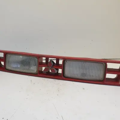Mitsubishi Colt III PRZEDNIA ATRAPA GRIL GRILL przód halogen