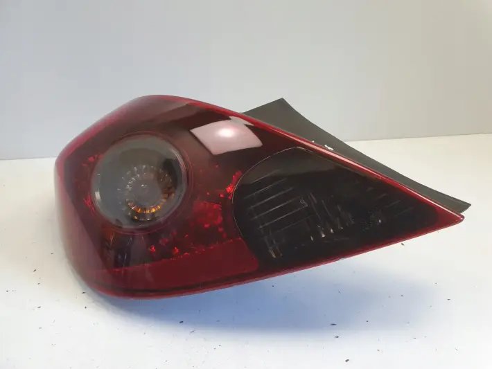 Opel Corsa D 3D HTB 06-14r TYLNIA LAMPA LEWA LEWY TYŁ 08-442-1953L depo