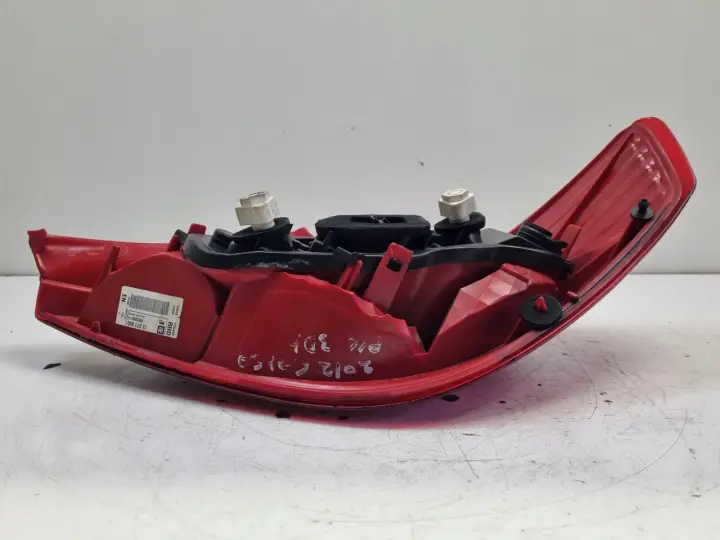 Opel Corsa D 3D HTB 06-14r TYLNIA LAMPA LEWA LEWY TYŁ 13211840 89038962A