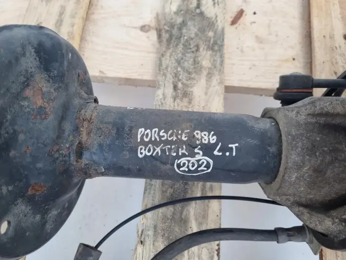 Porsche Boxster 986 LEWY TYLNY AMORTYZATOR Piasta zwrotnica tył 98633165720