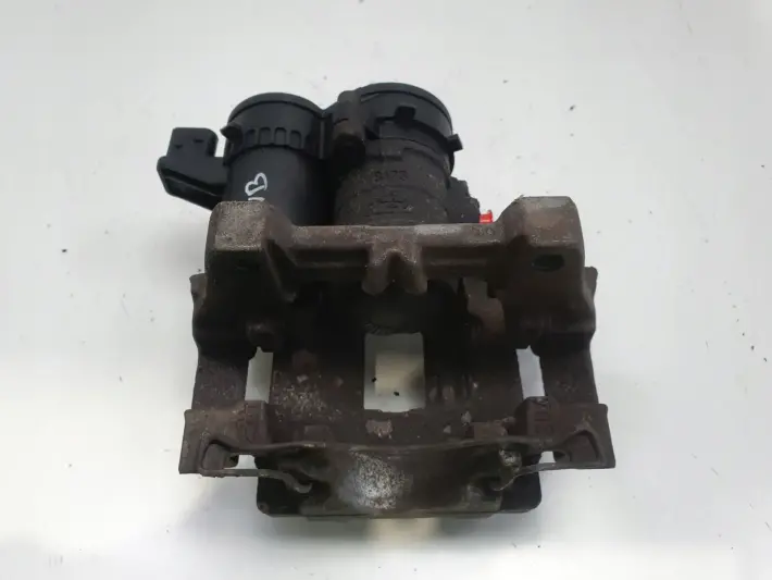 Volvo V60 XC60 II TYLNY ZACISK HAMULCOWY lewy tył 31687554