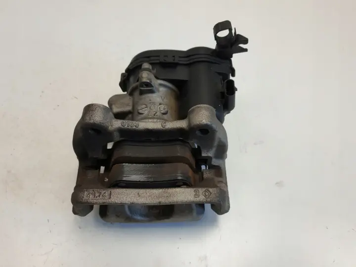Mercedes W246 LEWY ZACISK HAMULCOWY lewy tył