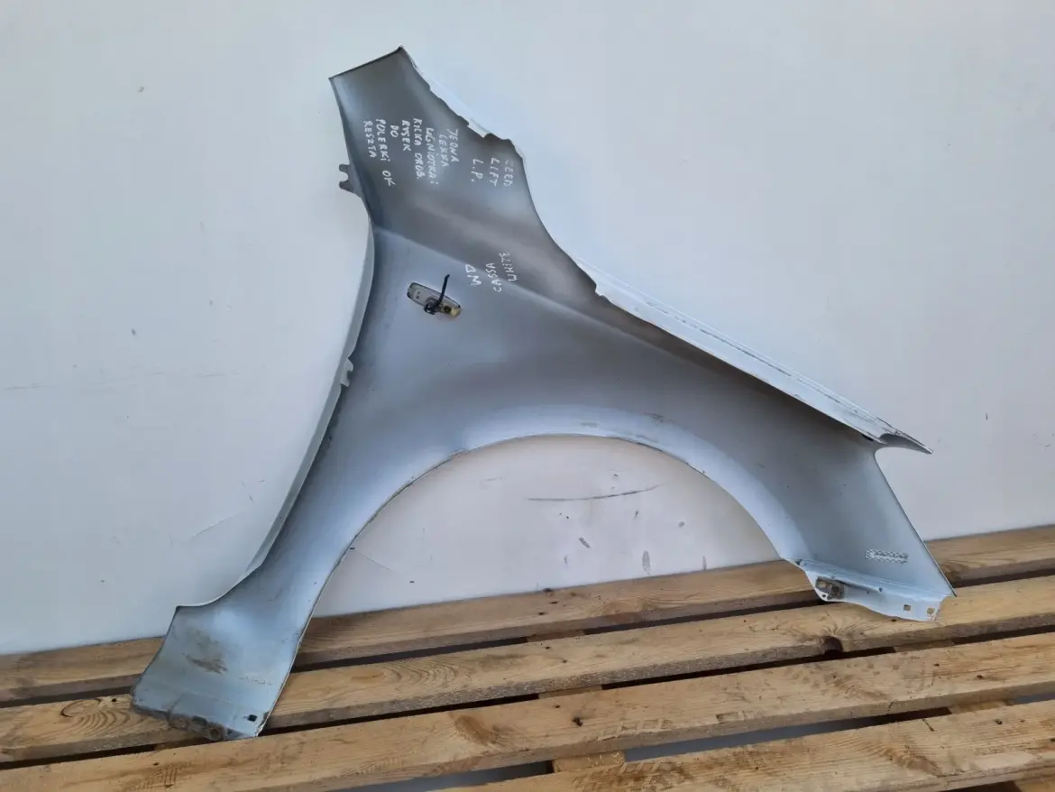 Kia Ceed Cee'd LIFT 09-12r PRZEDNI BŁOTNIK LEWY KIEROWCY WD Cassa White