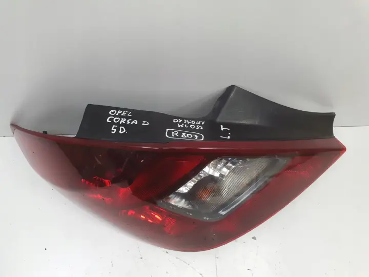 Opel Corsa D 5 drzwi TYLNA LAMPA LEWA lewy tył kierowcy Dymiona