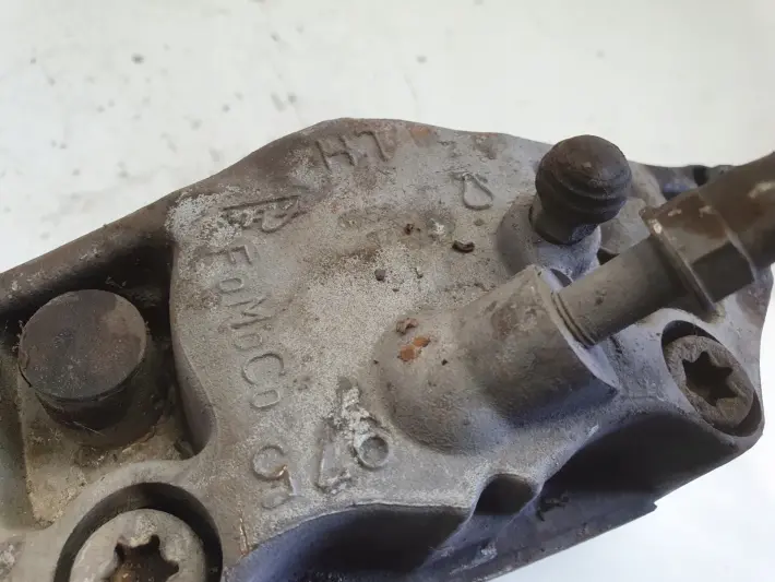 Volvo S40 II V50 PRZEDNI ZACISK HAMULCOWY Lewy przód kierowcy 975