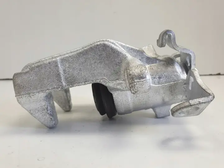 VW Golf IV LEWY ZACISK HAMULCOWY tył KIEROWCY
