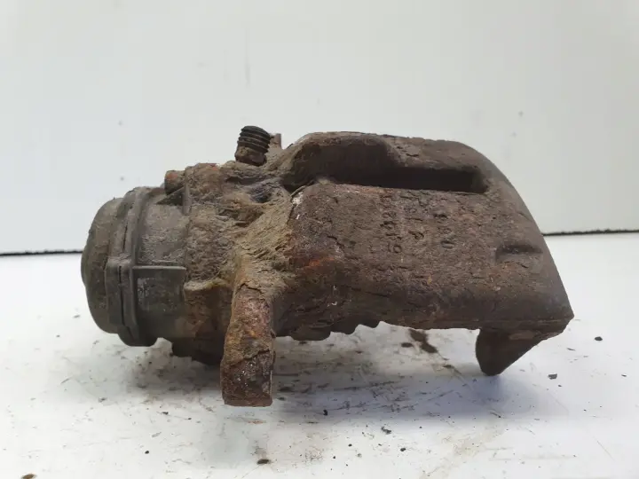Audi A4 B8 TYLNY ZACISK HAMULCOWY prawy tył ORYGINAŁ