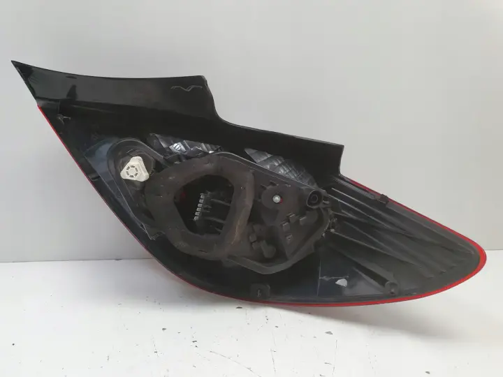 Opel Corsa D 5 drzwi TYLNA LAMPA LEWA lewy tył kierowcy Dymiona