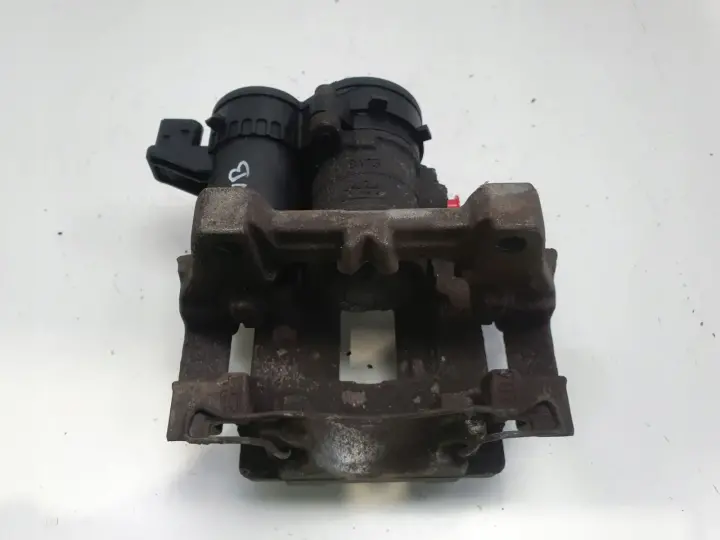 Volvo V60 XC60 II TYLNY ZACISK HAMULCOWY lewy tył 31687554