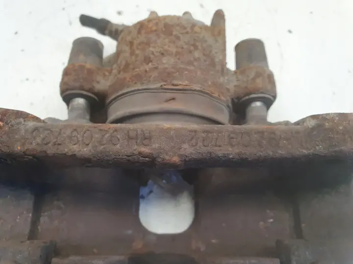 Volvo S60 I V70 II PRZEDNI ZACISK HAMULCOWY lewy przód kierowcy 829