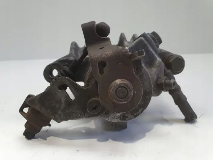 VW Golf IV Bora Audi A3 Toledo II LEWY ZACISK HAMULCOWY tył kierowcy Lucas
