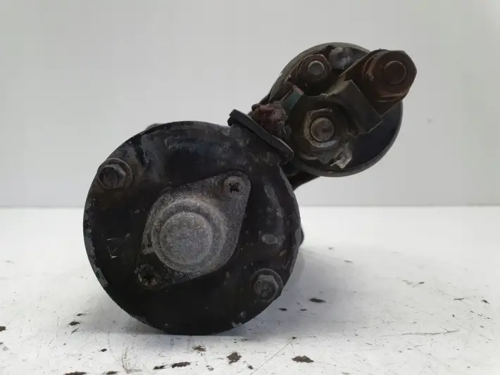 Opel Corsa D lift 1.0 12V ROZRUSZNIK bosch 55568572 0001107495 A10XEP