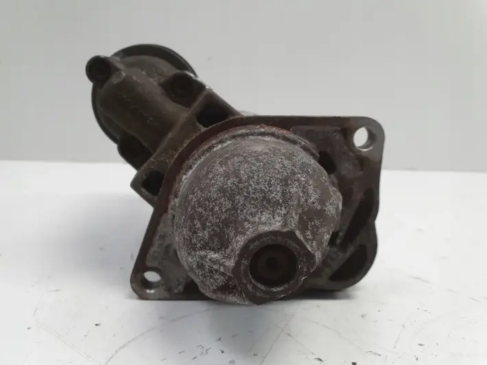 Opel Corsa D 1.4 16V ROZRUSZNIK bosch 0001107522