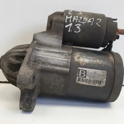 Mazda 2 1.3 16V ROZRUSZNIK M000T32771 oryginał