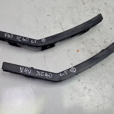 Volvo V40 II ŚLIZG TYLNEGO ZDERZAKA LEWY TYŁ