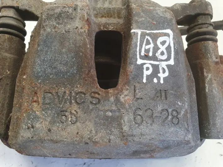 Toyota Rav4 III PRZEDNI ZACISK HAMULCOWY lewy przód kierowcy advics 63-28