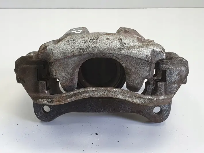 Toyota Corolla XII E21 PRZEDNI ZACISK HAMULCOWY lewy przód KIEROWCY L.P