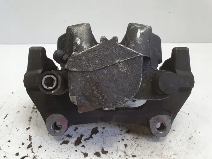 Volvo S60 III XC60 II PRZEDNI ZACISK HAMULCOWY lewy przód KIEROWCY 31665740