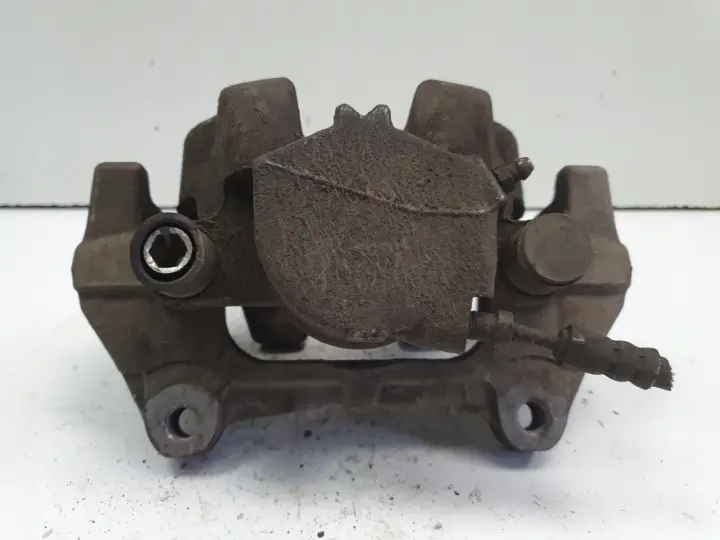 Volvo S60 III V60 XC60 II PRZEDNI ZACISK HAMULCOWY prawy przód PASAŻERA