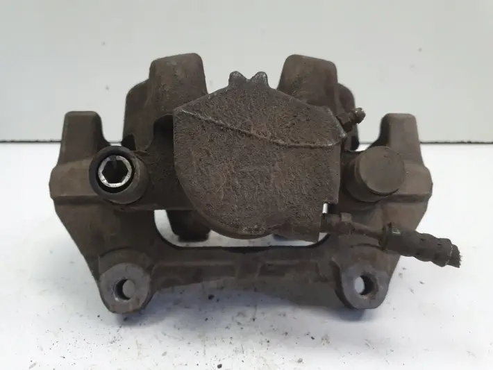 Volvo S60 III V60 XC60 II PRZEDNI ZACISK HAMULCOWY prawy przód PASAŻERA