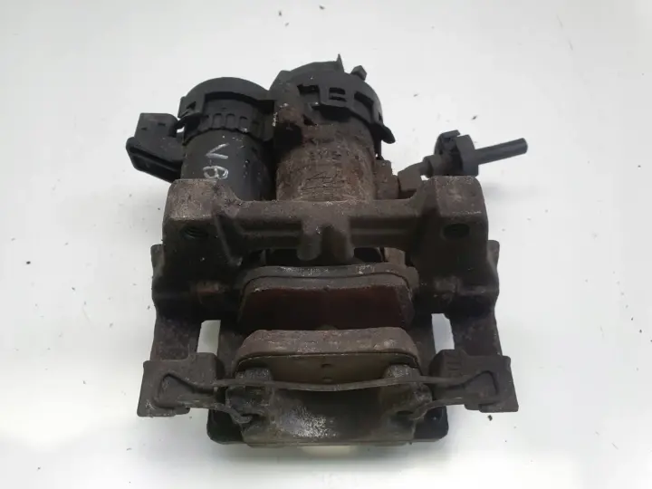 Volvo V60 XC60 II TYLNY ZACISK HAMULCOWY lewy tył 31687554