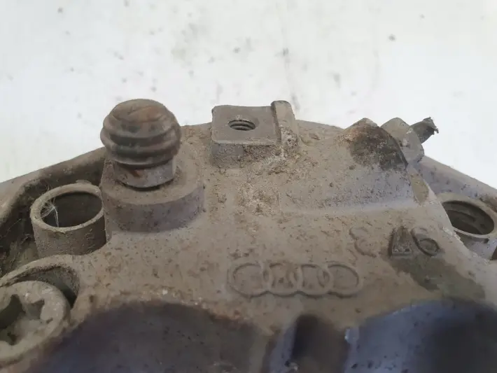 Audi A6 C6 PRZEDNI ZACISK HAMULCOWY lewy przód KIEROWCY