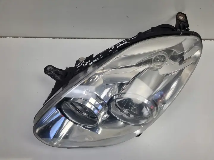 Fiat Doblo II 10-14r PRZEDNIA LAMPA LEWA lewy przód anglik 51817939