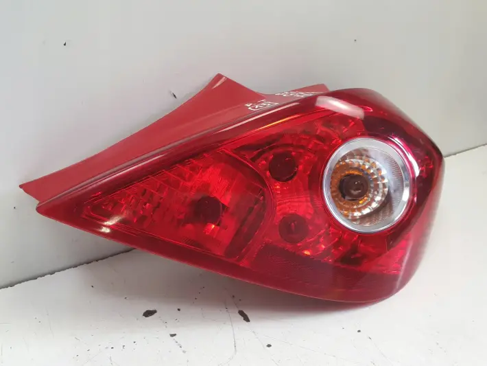 Opel Corsa D 06-14r TYLNA TYLNIA LAMPA PRAWA PRAWY TYŁ 13211841 89038963A