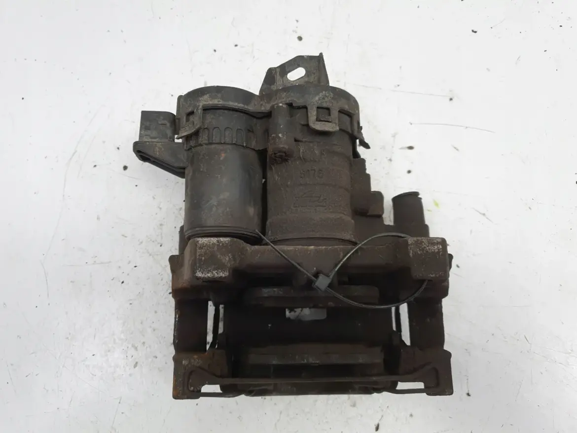 Volvo V60 XC60 II TYLNY ZACISK HAMULCOWY lewy tył 31687554