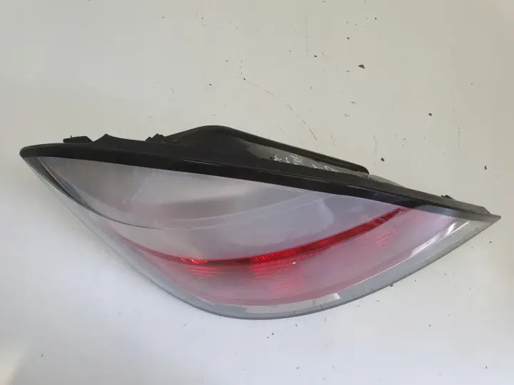 Opel Astra II H 5D 08-12r TYLNIA LAMPA LEWA LEWY TYŁ kierowcy 24-451-835