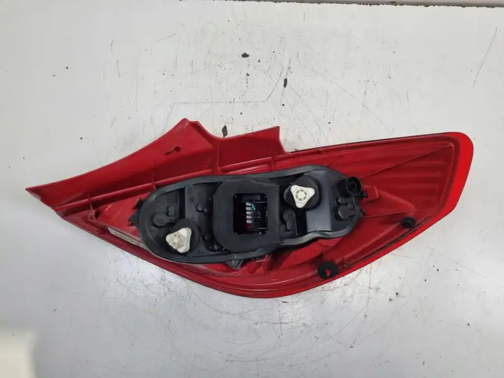 Opel Corsa D 3D HTB 06-14r TYLNIA LAMPA LEWA LEWY TYŁ 13211840 89038962A