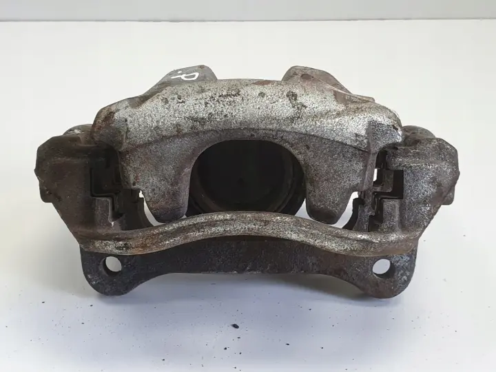 Toyota Corolla XII E21 PRZEDNI ZACISK HAMULCOWY lewy przód KIEROWCY L.P