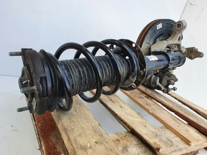 Santa Fe IV 2.2 CRDI PRAWY AMORTYZATOR PIASTA Przó