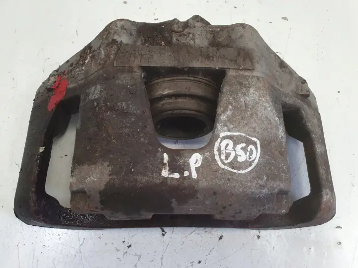 Volvo V40 II PRZEDNI ZACISK HAMULCOWY lewy przód KIEROWCY L.P 975