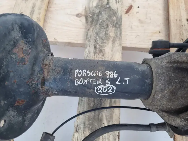 Porsche Boxster 986 LEWY TYLNY AMORTYZATOR Piasta zwrotnica tył 98633165720