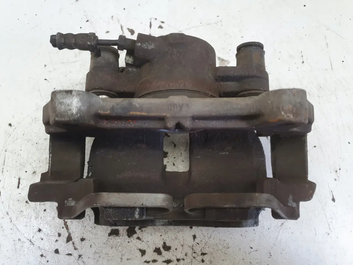 Volvo S60 III XC60 II PRZEDNI ZACISK HAMULCOWY lewy przód KIEROWCY 31665740