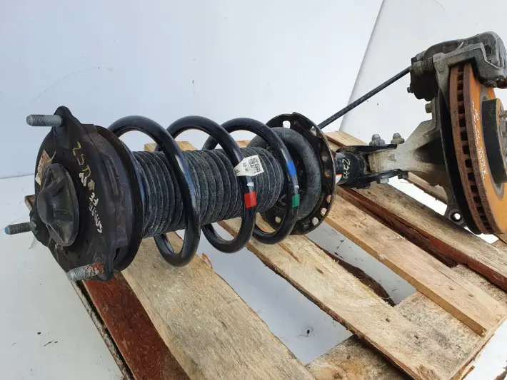 Santa Fe IV 2.2 CRDI PRAWY AMORTYZATOR PIASTA Przó